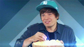this is an animated gif of jimmy fallon eating popcorn a great ...