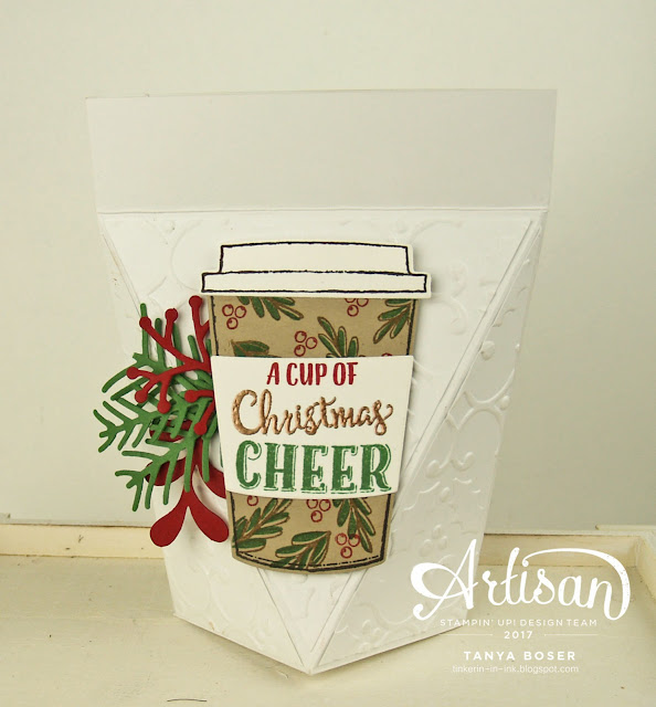 Pretty Pines dies, Merry Music DSP with Merry Cafe stamp set from Stampin' Up! That is one merry mix! This self-closing box is perfect for stocking stuffers and gifts for co-workers! It will hold all kinds of goodies including a gift card, chocolates, jewelry, and 1 ounce of loose leaf tea in a baggie!~Tanya Boser for the Artisan Design Team