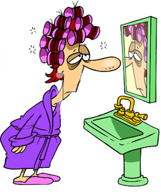 tired woman looking at the mirror