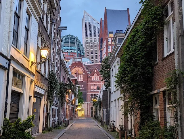 Skyscrapers in The Hague viewed from a historic alley