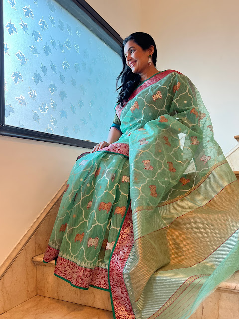 Sea green pichwai kota doria saree with cows