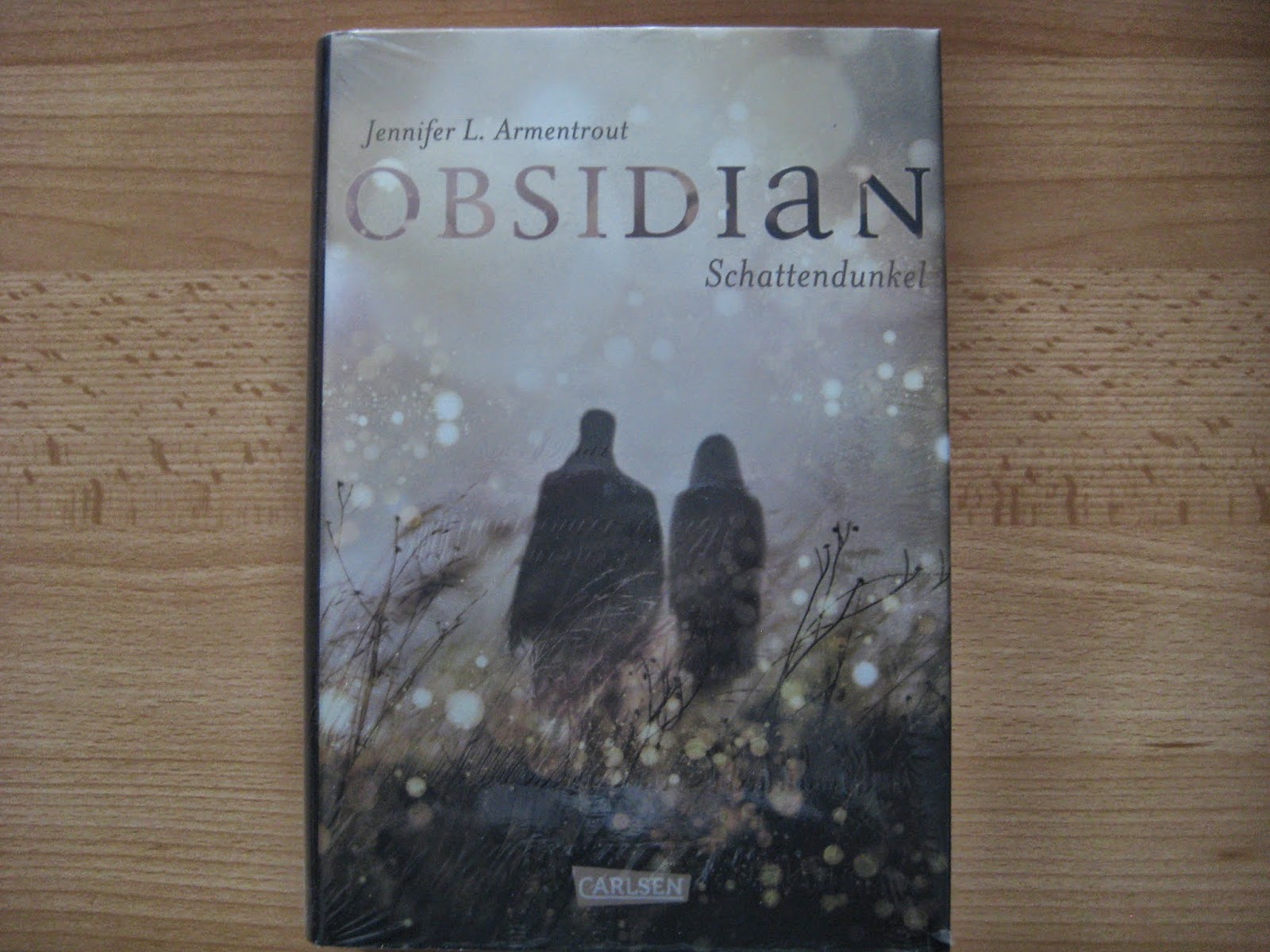 http://www.carlsen.de/hardcover/obsidian-band-1-obsidian-schattendunkel/40913#Inhalt