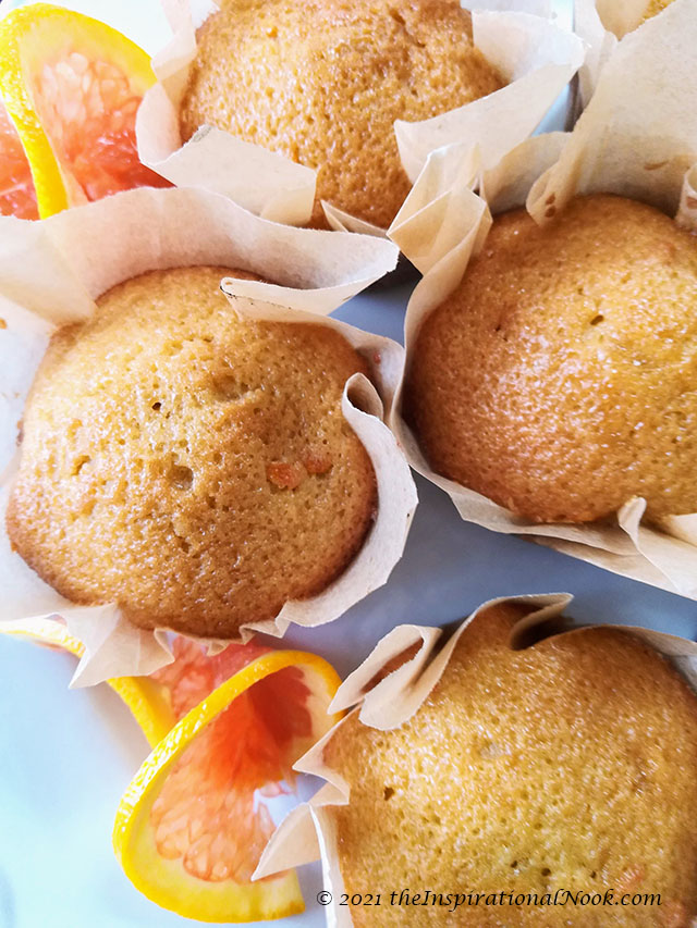 Olive oil muffins with slices of orange