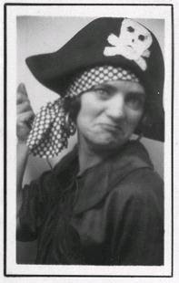 Young 1920's-era woman dressed as a pirate