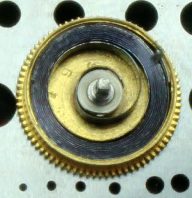 mainspring was lightly greased and replaced in the barrel.