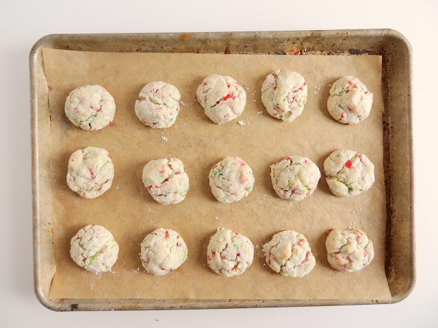 cookies on a parchment lined baking sheet.