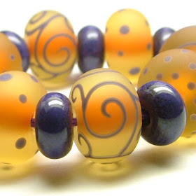 Etched lampwork glass beads