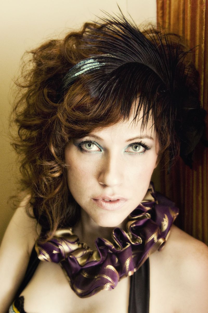 Hairstyles popular 2012: Cool Feathered Headband Hairstyle 