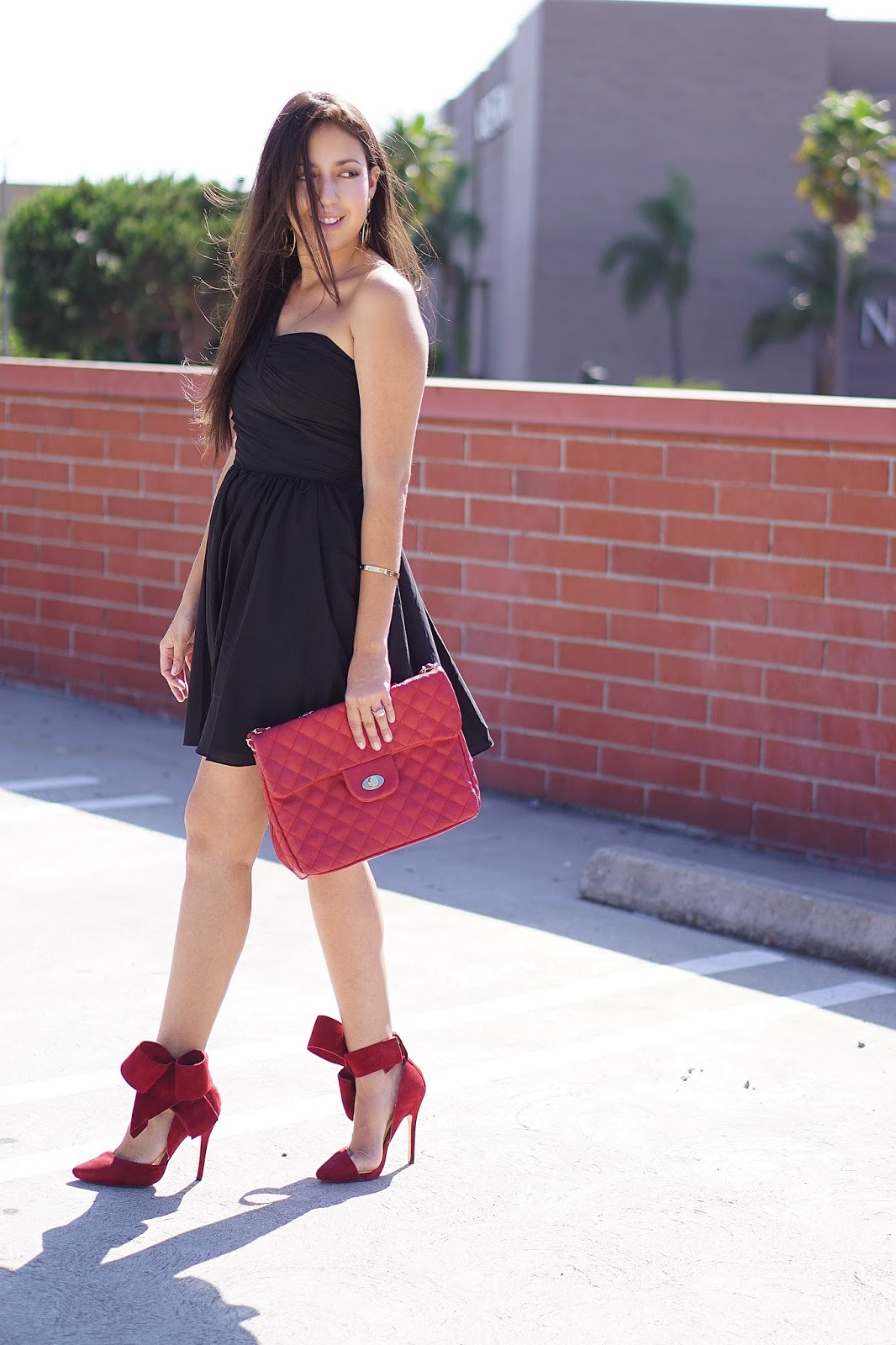 Aminah Abdul Jillil, Aminah Abdul Jillil Red Bow Pumps, Express, Little Black Dress, One Shoulder Black Dress, One shoulder Express Dress, Prima Donna Red Quilted Purse, Red Bow Heels, 