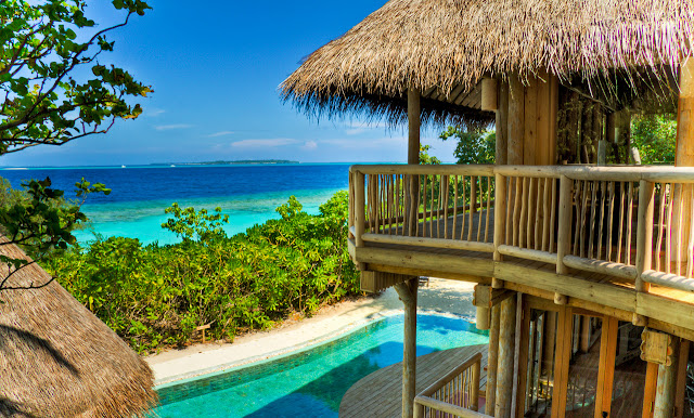 Photo of Indian Ocean and the beach as seen from the balcony of one of the houses in the Resort