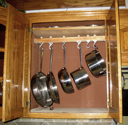 * Remodelaholic *: Installing An In-Cupboard Pot Rack