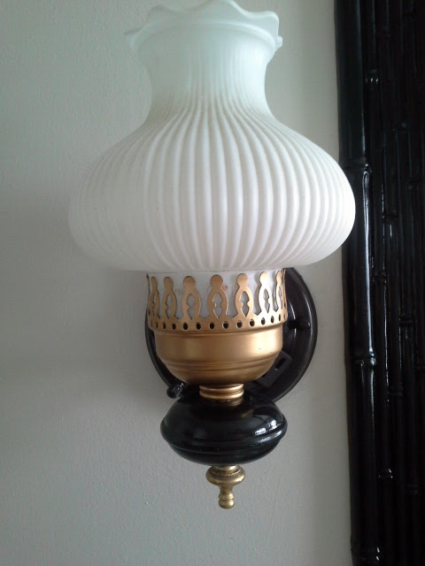 Vintage Bathroom Makeover gold and black light fixture