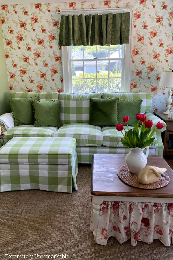 Floral Cottage Style Green Living Room with skirted coffee table