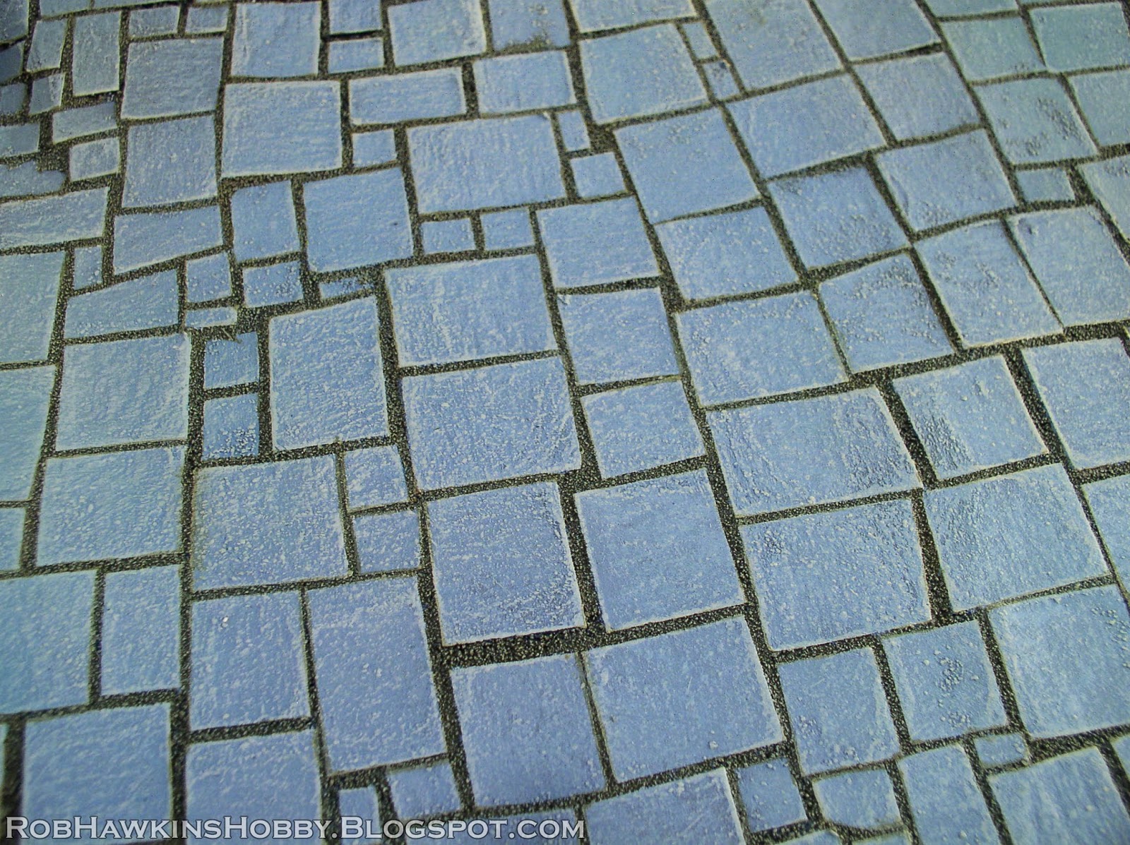 http://robhawkinshobby.blogspot.com/2014/07/terrain-tutorial-flagstone-streets.html