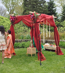 Mandap birch chuppah with deep gem tones floral corners and flower garlands for Ann Arbor wedding by Sweet Pea floral design 