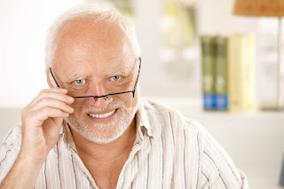 MAN ADJUSTING GLASSES