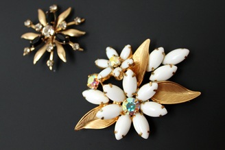 white floral brooch