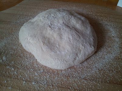 Note how much cornmeal I used, and how little I touched the dough to form it - it isn't even