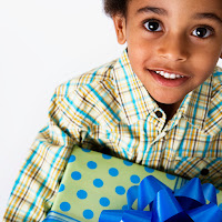 Little boy with wrapped present