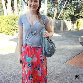 awayfromblue instagram knotting a grey tee over a floral maxi dress
