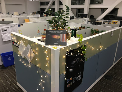 My desk at work last December, complete with pizza-shaped lights