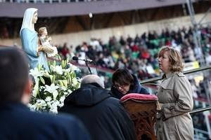 Image result for Medjugorje seer praying at a stadium in italy