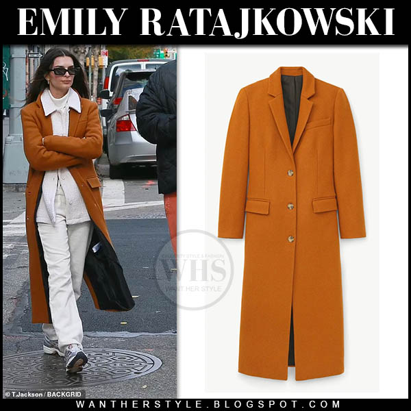 Emily Ratajkowski in burnt orange coat, white trousers and sneakers
