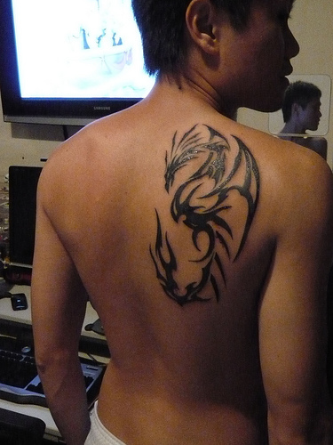 Tribal dragon tattoo