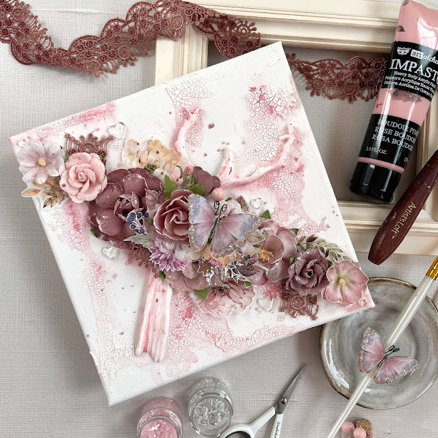 Mixed media canvas created with Prima paper flowers