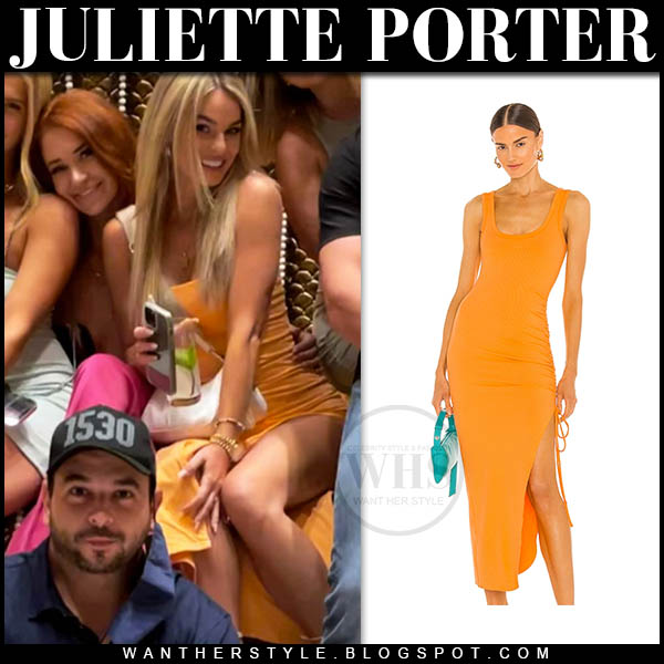 Juliette Porter in orange midi dress