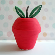 . bright green and she thought a green apple would be cute. (trinketbox apple )