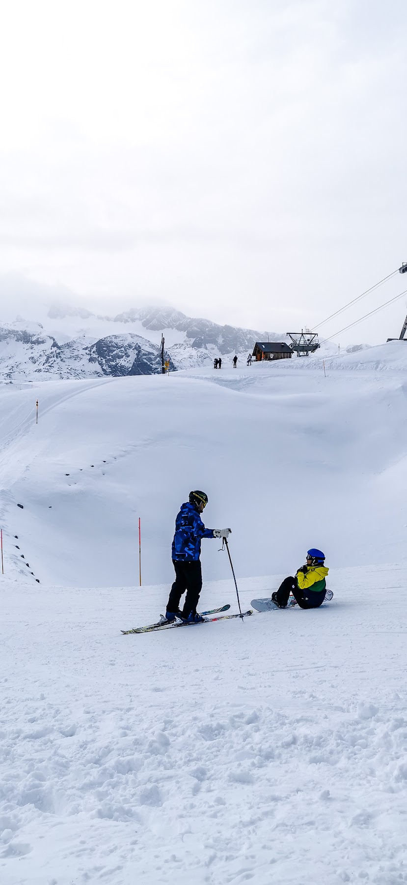 Skiers resting in the snow at 5 Fingers