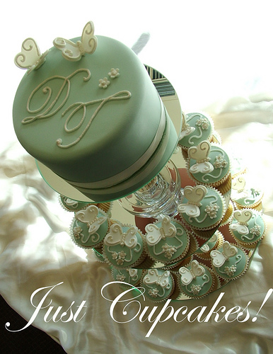 Wonderful green and white wedding cupcake inspiration with silver cupcake 
