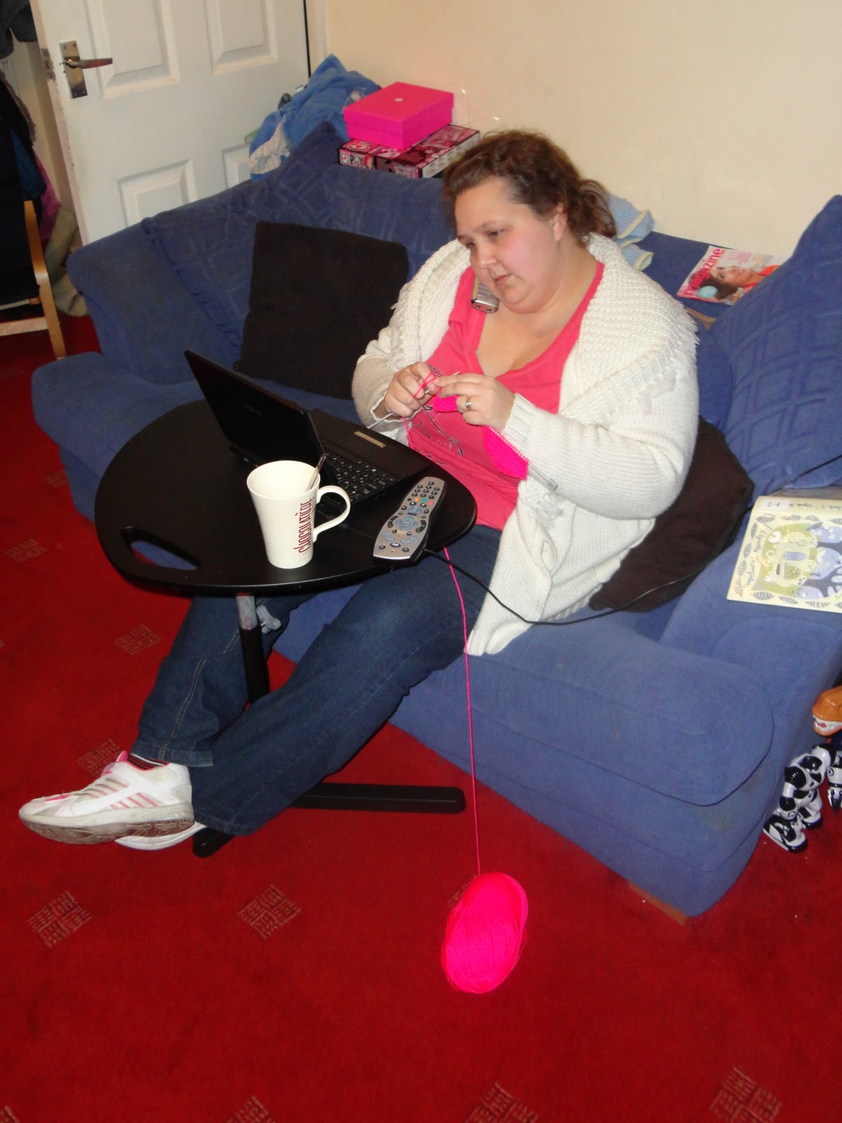 PippaD back in 2012, knitting, on the phone, drinking, on the laptop and reading...