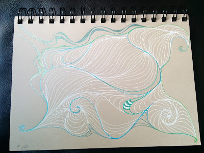 tan sketchbook paper with abstract drawing in white and metallic gel pen using auras in the zentangle style