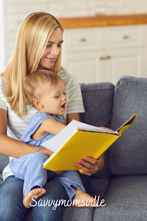 A mother reading to her baby boy