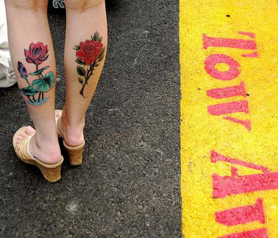 rose tattoo designs on girls leg tattoos