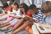 five youth reading books