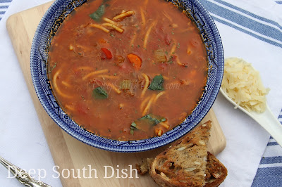 Spaghetti Lover's Soup is easily made either from scratch, or using leftover meat sauce and spaghetti noodles or store-bought pasta sauce. Starting with The Trinity of southern cooking and adding carrots, provides intense flavor to this broth and tomato based soup. Spoon over pasta, sprinkle with a bit of parsley, torn fresh basil and freshly grated Parmesan for a nice finish. Pair it with some garlic bread or slices of a crusty, whole grain bread.