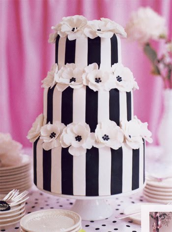 The first three wedding cakes have round tiers decorated in black and white