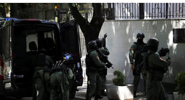Albanian anti-terrorist forces entering the Iranian embassy in Tirana