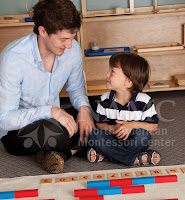 older child helping younger boy most challenging montessori student