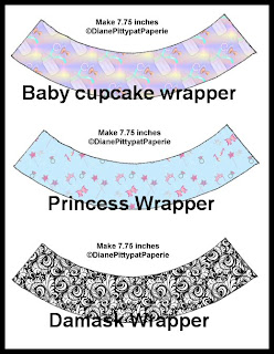 http://pittypatpaperie.blogspot.com/2009/12/cupcake-wrapper-freebies.html