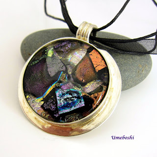 https://umeboshi.indiemade.com/product/mother-lode-large-handmade-dichroic-fused-glass-pendant-multi-colored