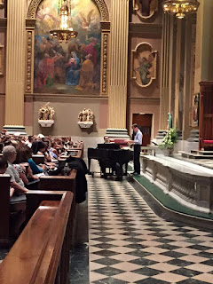 David Kimock practicing with choir in Cathedral Basilica of Saints Peter and Paul in in preparation for Pope Francis