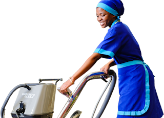 A woman cleaning a carpet