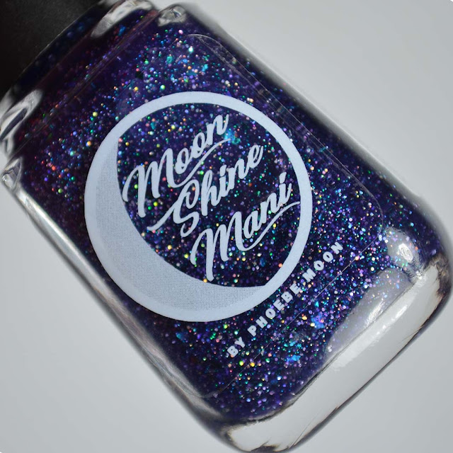 purple glitter nail polish in a bottle