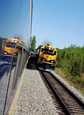 Passing_Reflection___AK_Train_by_cooley2-585x800