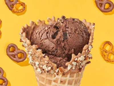 A Ben & Jerry's Salted Caramel Dipped Waffle Cone with Impressively Fudged ice cream.