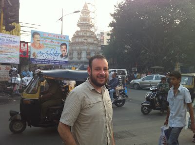 Pune India street scene temple tourist camp